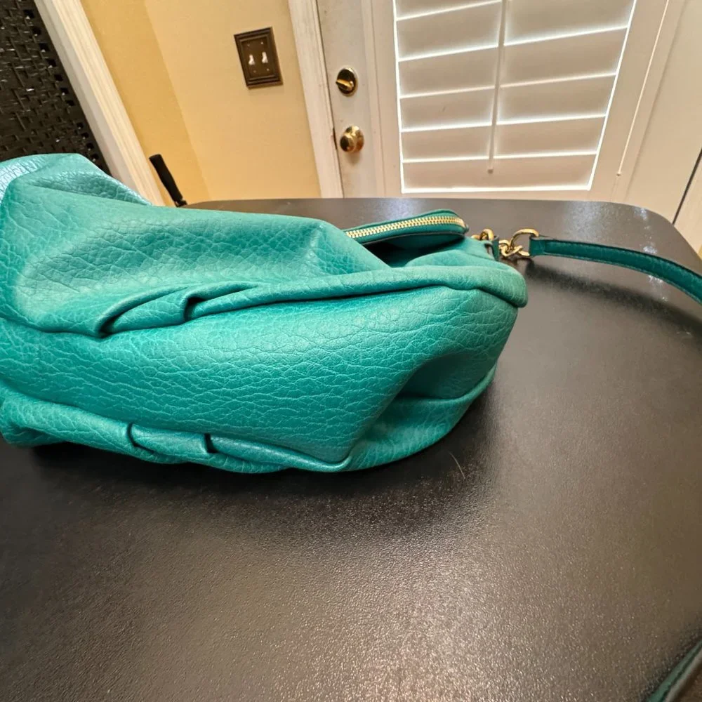 Juicy Couture faux leather teal crossbody bag